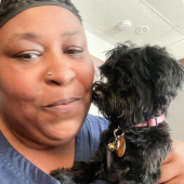 Closeup of woman and her newly received puppy